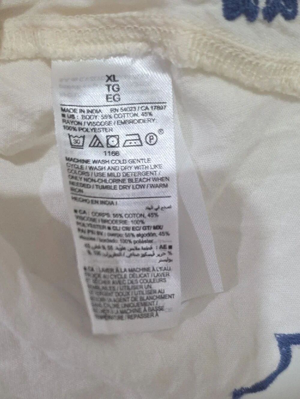 Old Navy Cream Peasant Blouse with Blue Floral Embroidery